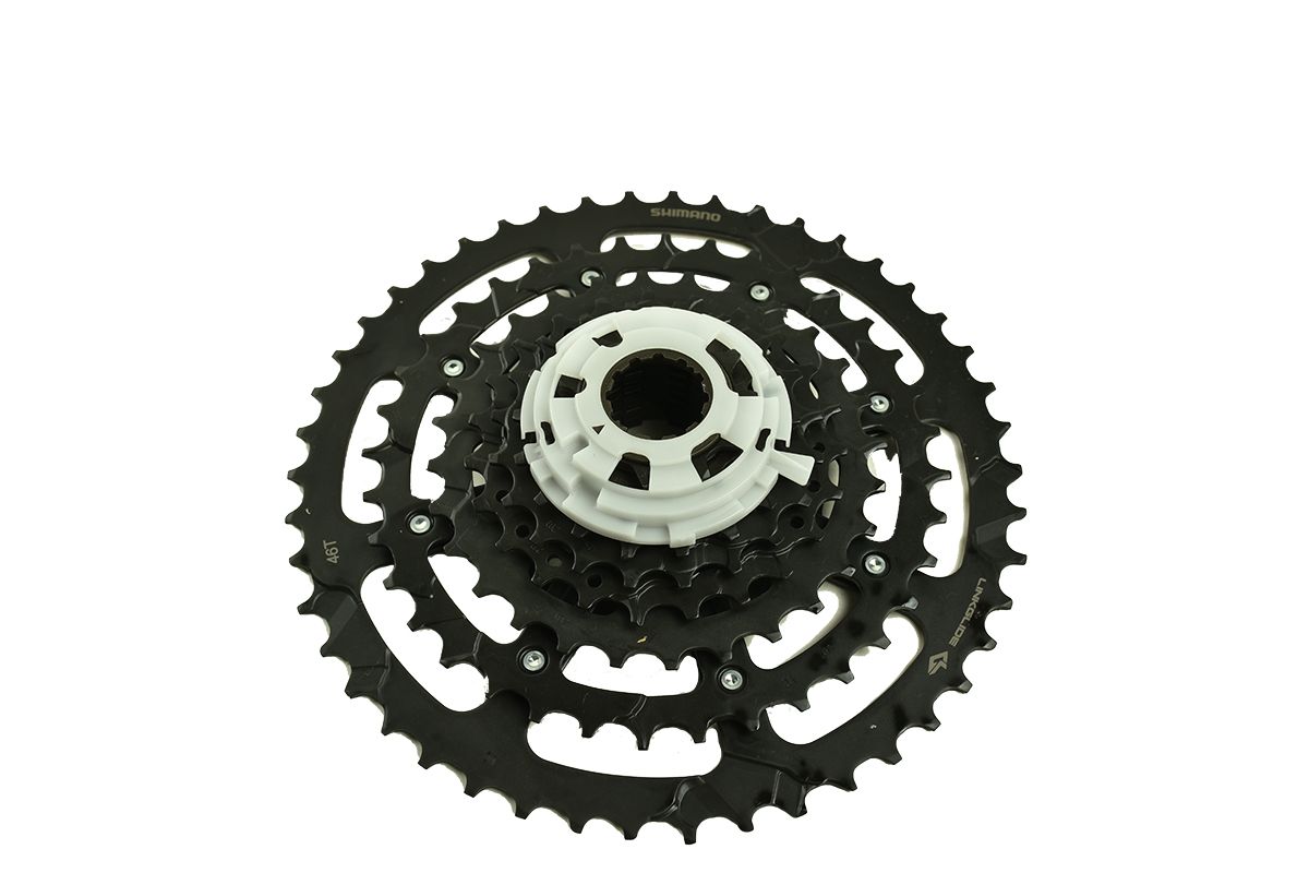 Кассета SHIMANO CUES, LINKGLIDE, CS-LG300-9 11-46T 9 скоростей (11-13-15-17-20-23-28-36-46T) ACSLG3009146 Кассета SHIMANO CUES, LINKGLIDE, CS-LG300-9 11-46T 9 скоростей (11-13-15-17-20-23-28-36-46T) ACSLG3009146